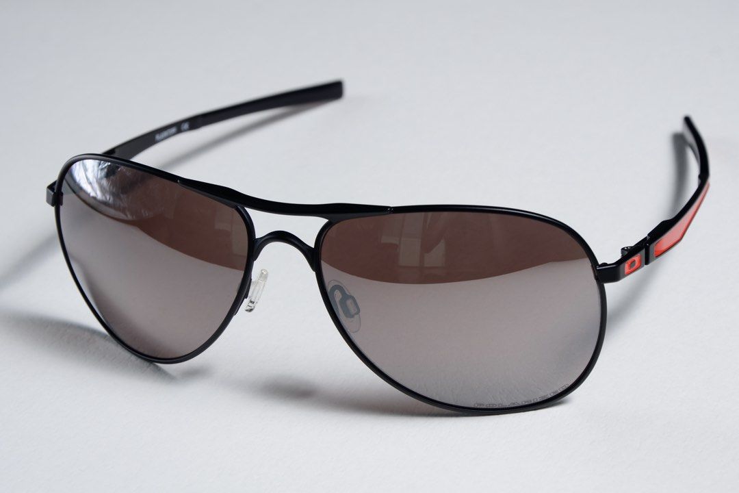 Oakley Plaintiff Polarized Sunglasses (Category: Sunglasses & Eyewear) located in Pasig City. Submitted by shifter168 (Listing ID 1468092926, Image 3). Description: Authentic and brand new old stock Selling low - Brand: Oakley Plaintiff - Color: Matte black with red accents - Lenses: Polarized for zero glare and crystal clear vision - Frame Shape: Aviator - Condition: Pristine, zero scratches or wear marks - Inclusions: Complete set with original