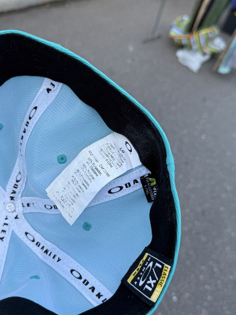 Oakley tincan cap (Category: Caps & Hats) located in Daraga. Submitted by casualthread (Listing ID 1468185880, Image 3). Description: Authentic L/XL on tag Need wash lang 10/10.