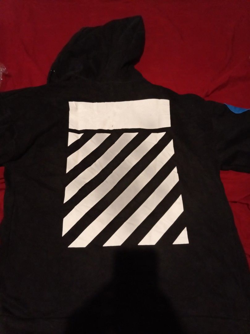 Off- White Patches Zip-up Hoodie (Category: Coats, Jackets and Outerwear) located in Tuguegarao City. Submitted by nibordelac60216 (Listing ID 1468059394, Image 3). Description: XL on tag Width 23.5 Length- 30 Excellent condition Issue: small scratch back print. Check photos Off only.