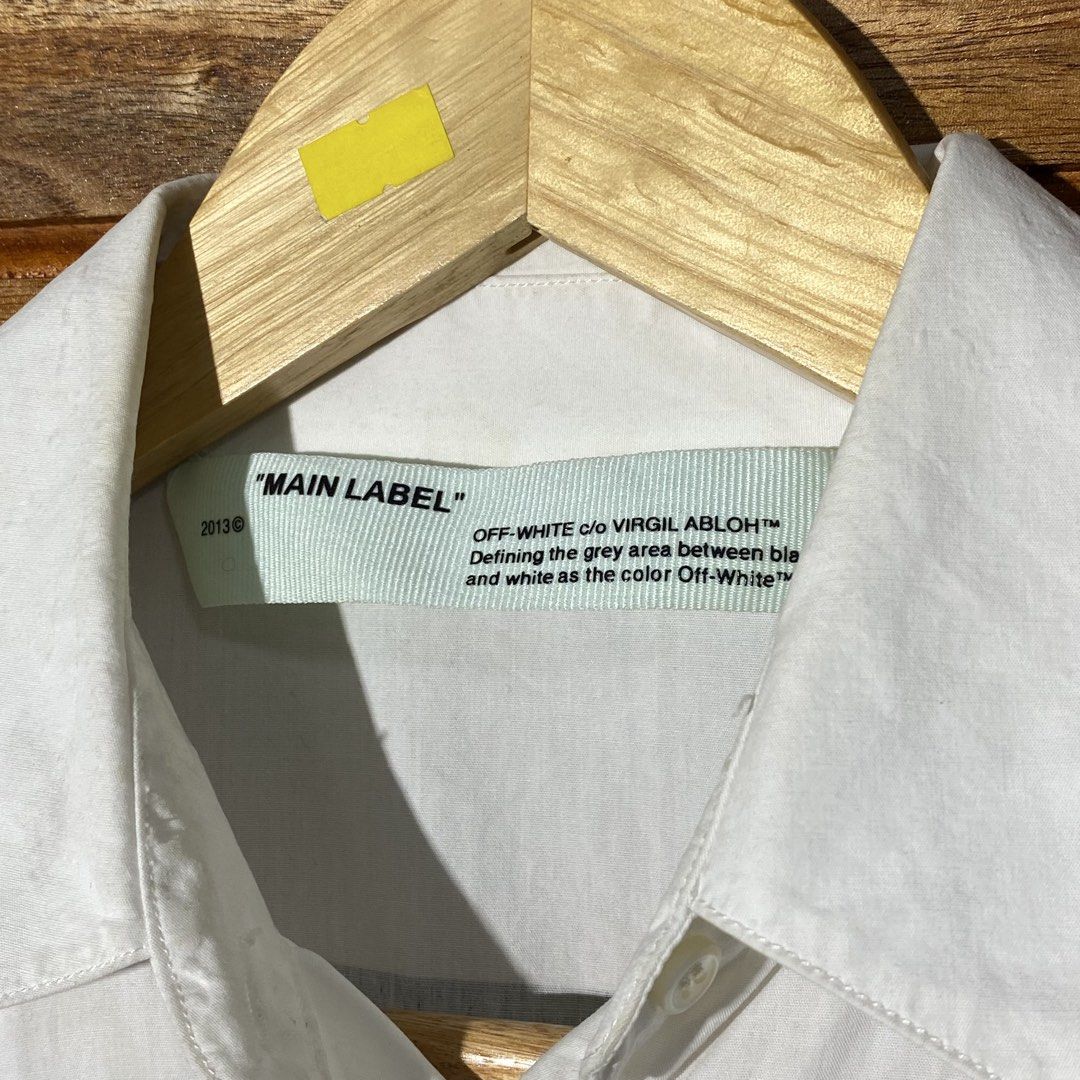 Off-White Button-Up Shirt (Category: Shirts) located in Andop. Submitted by rhouzze.ph24 (Listing ID 1468173618, Image 3). Description: OPEN FOR NEGOTIATION Name: Off White Dimensions: 20.5 by 39 Size: Medium Issue: None.