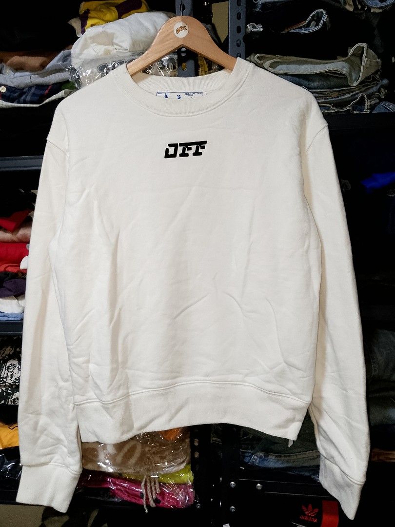 Off-White White Crewneck Sweatshirt Size M (Category: Coats, Jackets and Outerwear) located in Manila. Submitted by mjthrifted_second (Listing ID 1468073225, Image 1). Description: - Brand: Off-White - Item: Crewneck Sweatshirt - Color: White - Size: M (Tagged with interior product code) -Dimes: 20/25 - Material: 100% Cotton - Origin: Made in Portugal - Design: Logo embroidery on chest, ribbed cuffs and hem - Style: Classic streetwear.