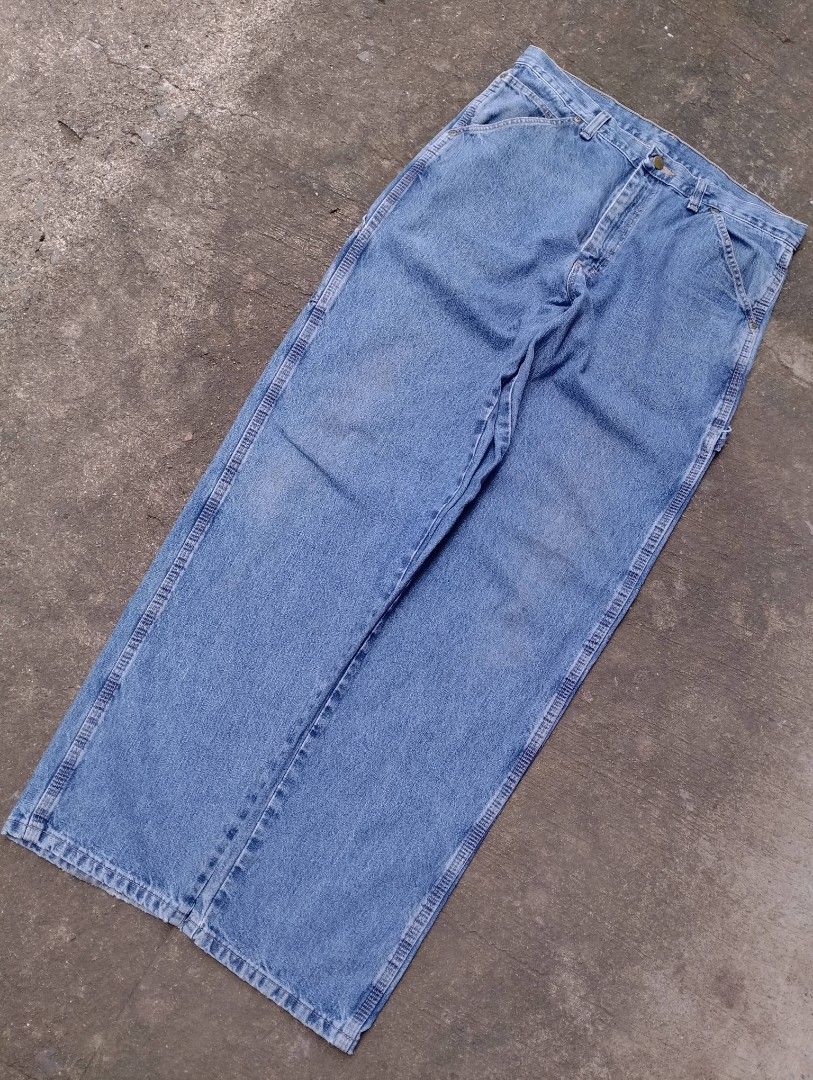 Old Mill Carpenter Denim Jeans (Category: Jeans) located in Bago City. Submitted by the_outcast6101 (Listing ID 1468278588, Image 3). Description: - Brand: Old Mill - Style: Classic straight leg carpenter jeans - Color: Light wash denim - Features: Utility side pocket, hammer loop, YKK zipper fly, and branded metal button - Details: Leather patch on the back waistband and standard belt loops - Material: Durable cotton construction - Condition: Ex