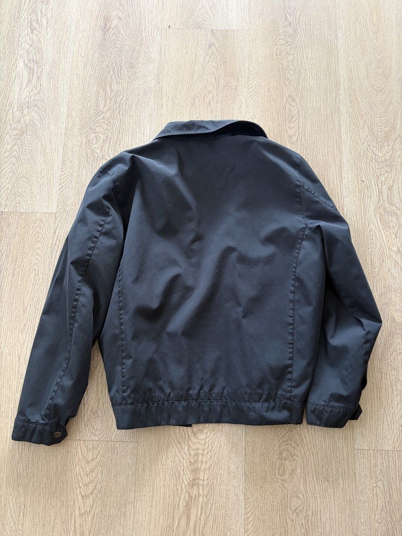 Old Navy Black Zip Up Collared Jacket (Category: Coats, Jackets and Outerwear) located in Makati City. Submitted by sbllia (Listing ID 1468102652, Image 2). Description: - Brand: Old Navy - Color: Classic Black with Grey inner lining - Size: Medium - Closure: Front zip - Features: Collar, side pockets, and snap button cuffs.