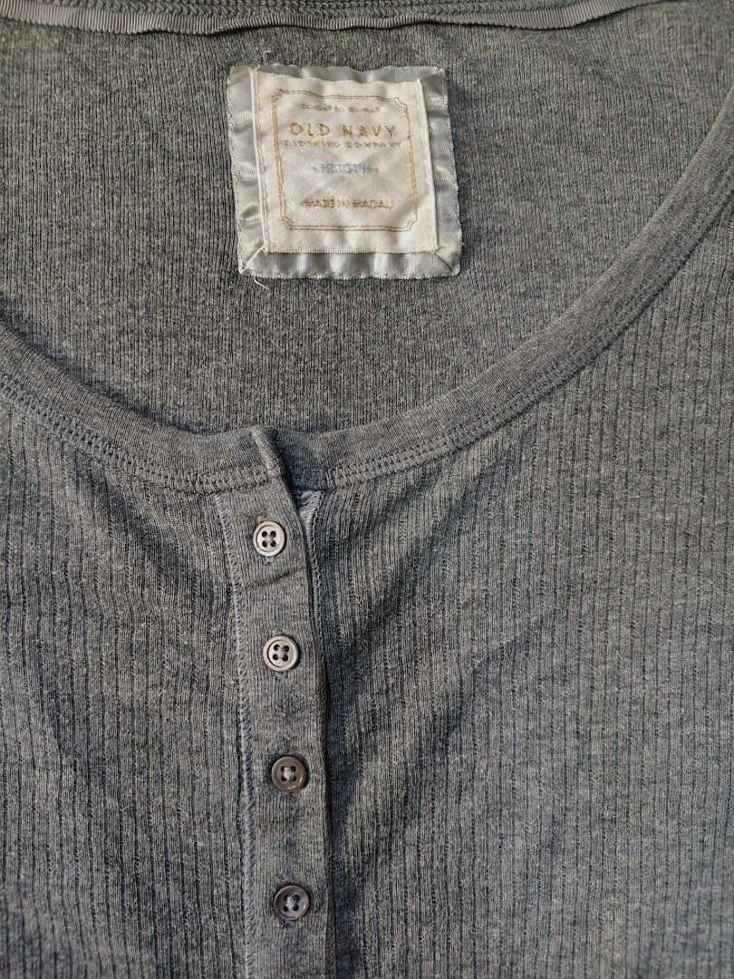 Old Navy Gray Ribbed Long Sleeve Henley Top Medium (Category: Longsleeves) located in Quezon City. Submitted by andreialej28522 (Listing ID 1468061381, Image 3). Description: - Brand: Old Navy - Color: Gray - Size: Medium (fits true to size) - Material: Soft stretch fabric - Design: Ribbed texture, scoop neckline, functional front button placket, long sleeves with extended cuffs - Condition: Great, clean, smoke-free home - Perfect for layering du