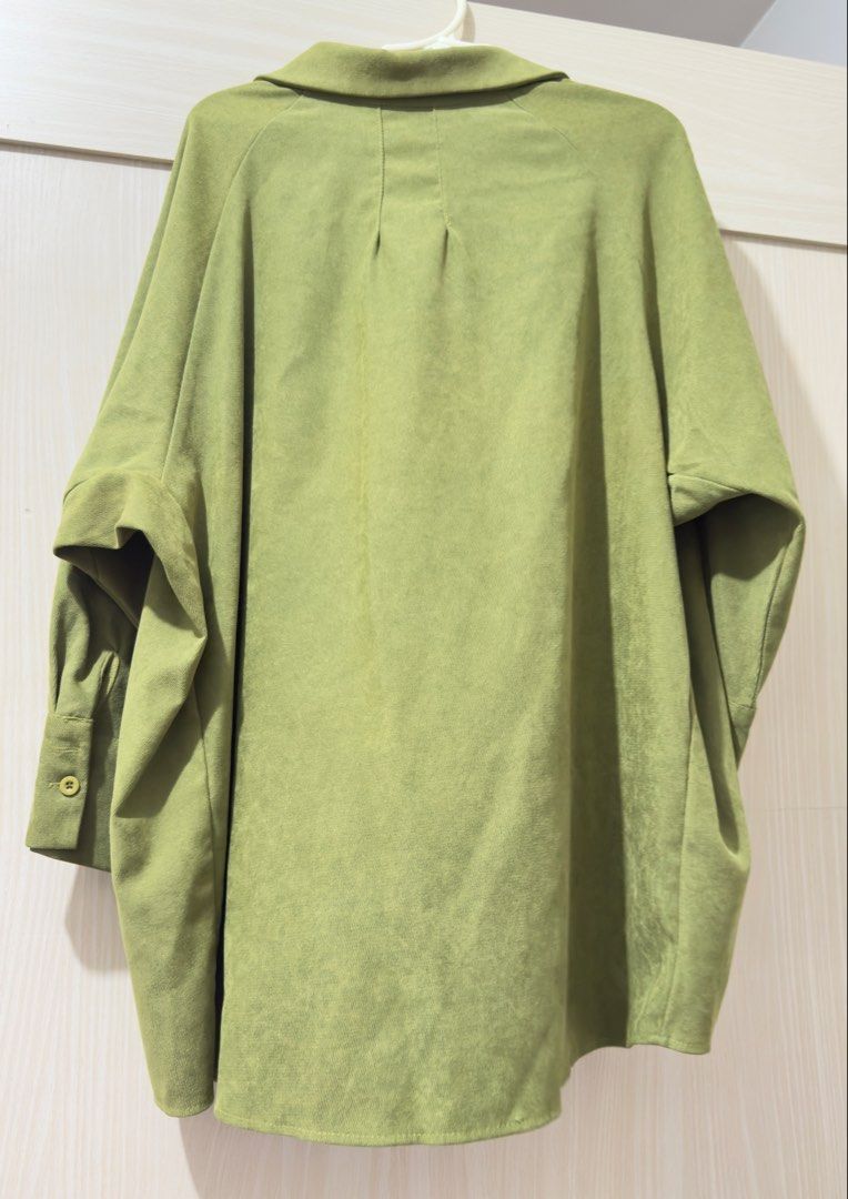 Olive green button-up collared long sleeve shirt (Category: Longsleeves) located in Manila. Submitted by warmbird.ac6e1a (Listing ID 1468216206, Image 2). Description: - Color: Olive green (earthy tone) - Material: Soft suede-like texture .