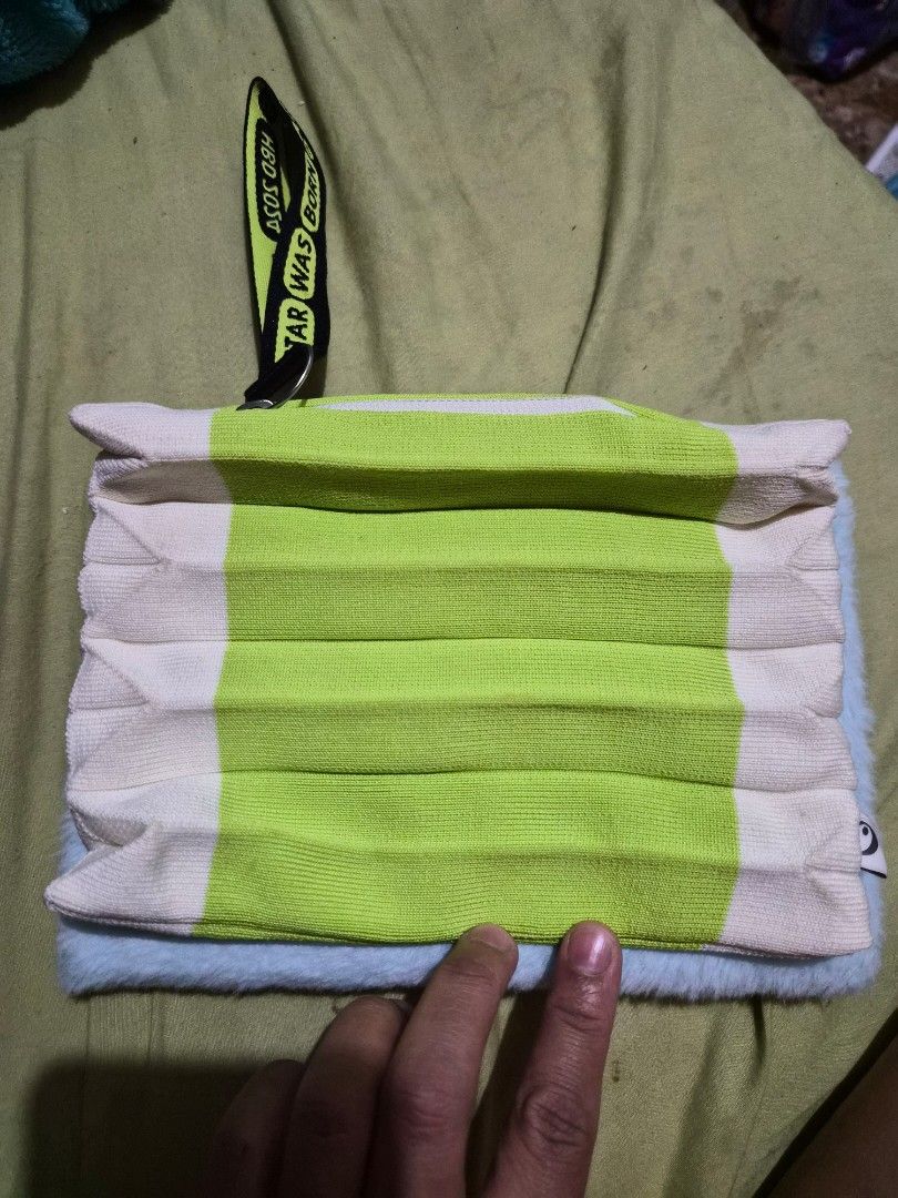 Olive Young HBD Edition 2024 Pouch Green White (Category: Purses & Pouches) located in Mandaue City. Submitted by chuchi152615 (Listing ID 1468148942, Image 1). Description: - Authentic Olive Young HBD Edition 2024 pouch - Trendy green and white striped ribbed knit material - Secure zipper closure down the side - Includes a black wrist strap with printed text - Features an eye logo tag on the inner seam - Comes with a soft fuzzy blue backing pad.