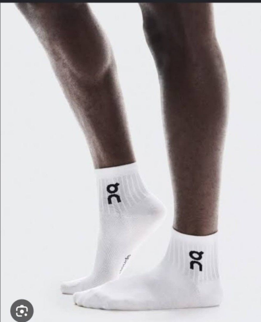 On Running Logo Sock Mid White (Category: Socks) located in Quezon City. Submitted by maynardshop (Listing ID 1468123634, Image 1). Description: - Brand: On Running - Style: Logo mid socks with clean ribbed design and bold black lettering - Color: White - Condition: Brand new, unworn with original tags attached on cardboard hangers - Material: Soft cotton feel - Sizes Available: S, M, and L.