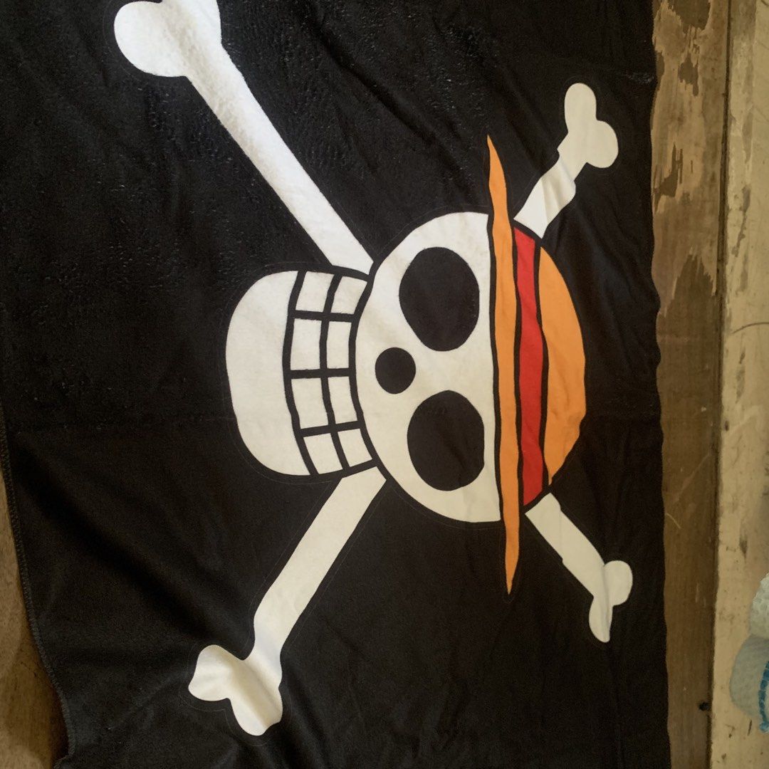 One Piece Run Philippines Official Event Flag Banner (Category: Towels, Napkins & Holders) located in Caloocan City. Submitted by diannecarl32964 (Listing ID 1468092716, Image 3). Description: - Official One Piece Run Philippines event banner - Features iconic Straw Hat Pirates Jolly Roger on a black background - Includes official event branding logos and copyright text along the edge - Standard flag size made of durable fabric material - Must-ha