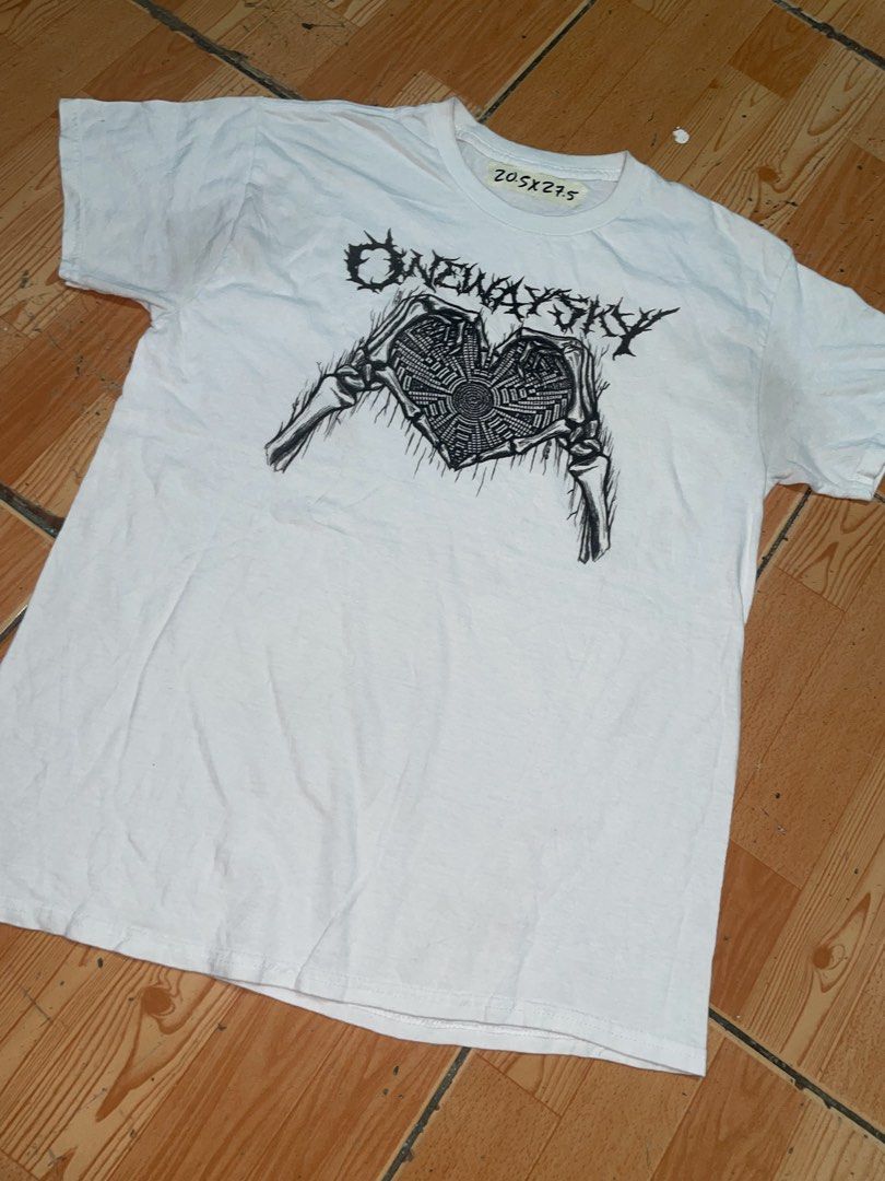 Onewaysky White Graphic Tee Skeleton Heart (Category: Shirts) located in Manila. Submitted by joshua_guimeroy. (Listing ID 1468215636, Image 1). Description: - Brand: Onewaysky - Color: White - Design: Large black graphic print with skeleton hands forming a heart, maze details, and barbed wire lettering - Fit/Style: Short sleeves, crew neck, great streetwear aesthetic - Material: Clean cotton fabric - Measurements: 20.5 inches chest width x 27.5 
