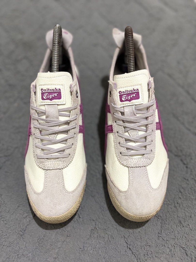 Onitsuka Tiger Mexico 66 Off White Purple (Category: Sneakers) located in Lapu Lapu. Submitted by jadegodine04736 (Listing ID 1468149281, Image 2). Description: - Brand/Model: Onitsuka Tiger Mexico 66 - Colorway: Off-white leather upper with purple stripes and grey suede overlays - Style: Classic low-top retro runner - Size: US 4.5 / EUR 37 / 23.0 cm - Origin: Made in Vietnam - Condition: Clean overall with minimal wear on soles and uppers.
