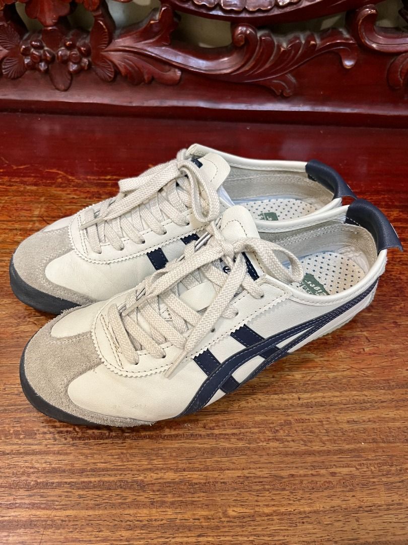 Onitsuka Tiger Mexico 66 White Navy (Category: Sneakers) located in Mabalacat. Submitted by applebottomjaens (Listing ID 1468109371, Image 1). Description: - Brand: Onitsuka Tiger Mexico 66 - Colorway: White and Navy Blue - Size: US 6.5 / EUR 39.5 / CM 25.0 - Condition: Clean uppers with minimal wear on outsoles - Style: Classic low-top with signature side stripes and suede overlays - Perfect for everyday casual wear and easy to match with any ou