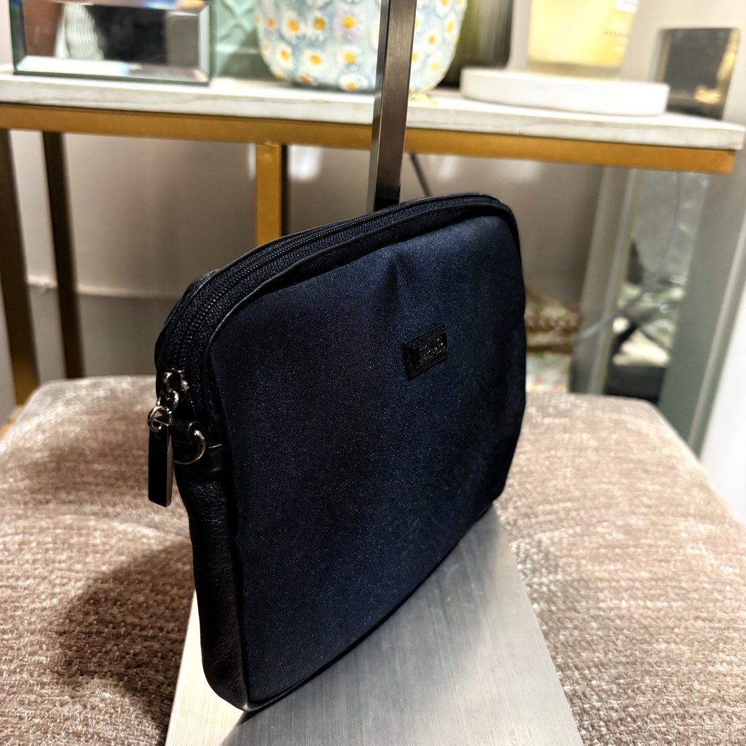 Original Cobo Japan Black Pouch (Category: Purses & Pouches) located in Binangonan. Submitted by makoleksyon (Listing ID 1468233886, Image 2). Description: Brand new condition Like new No flaws Nylon and genuine leather trim material Size: H-5.5 x W-6.5 x D-1 inches.