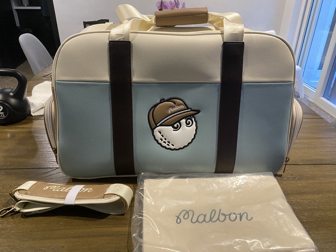 Original Malbon Golf Classic Boston Bag Dark Mint (Category: Luxury Bags & Wallets) located in Manila. Submitted by chiquita0607 (Listing ID 1468081868, Image 2). Description: - Brand: Malbon Golf - Style: Classic Boston Bag - Colorway: Dark Mint, Cream, and Light Blue with Dark Brown straps - Details: Embroidered golfer logo patch on front and Malbon Golf wording on the back - Storage: Large main compartment - Inclusions: Matching golf ball char