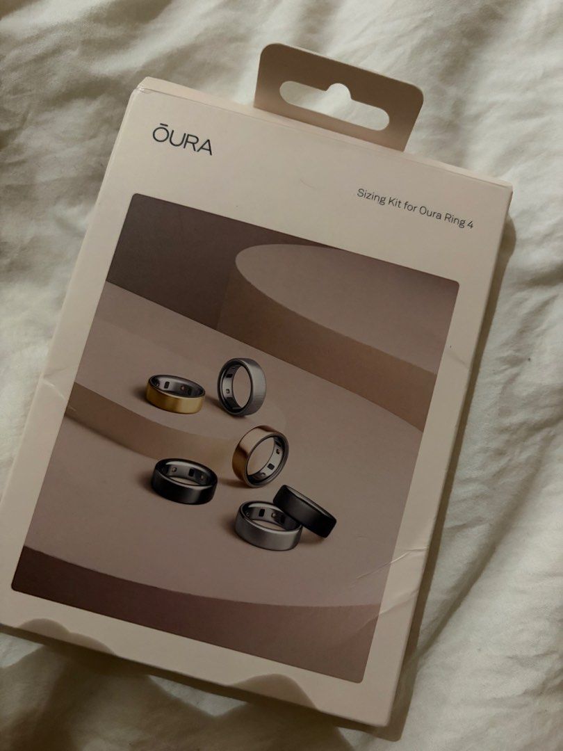 Oura Ring 4 Sizing Kit (Category: Wearables & Smart Watches) located in Paranaque City. Submitted by francesgl (Listing ID 1468159793, Image 1). Description: - Oura Ring 4 sizing kit in original box - Includes plastic sample rings sizes 4 through 12 to find your exact fit - All pieces neatly arranged in the molded tray - Packaging shows minor wear on the outer cardboard sleeve SF c/o Buyer Gogoexpress / Lalamove / Grab.