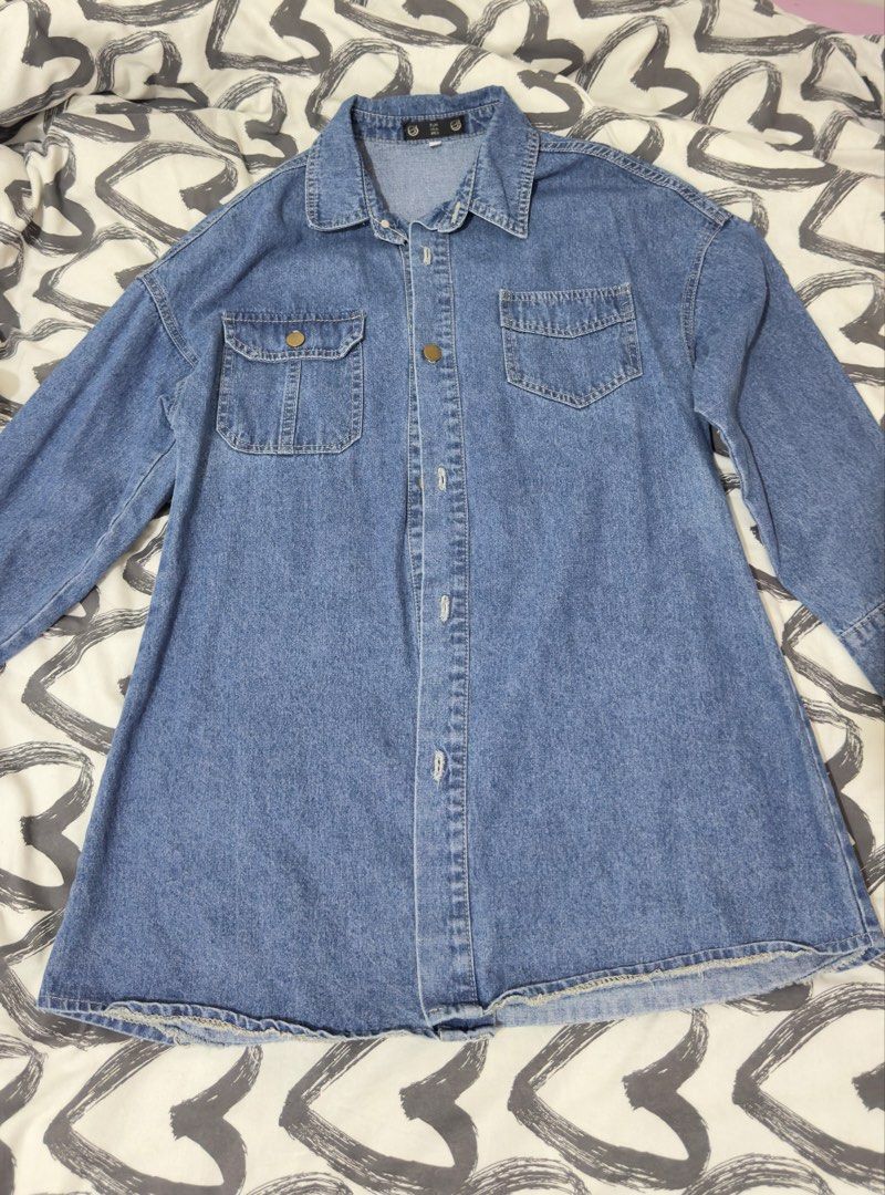 Oversized Blue Denim Shirt with Pockets (Category: Shirts) located in Manila. Submitted by warmbird.ac6e1a (Listing ID 1468215847, Image 1). Description: - Color: Medium wash blue .