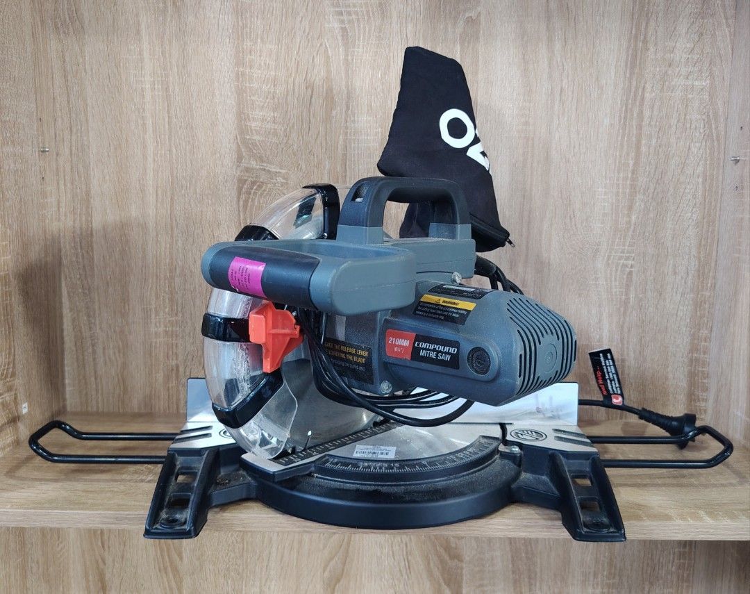 Ozito Compound Mitre Saw (Category: Construction Tools & Equipment) located in Manila. Submitted by rollysuela09206 (Listing ID 1468072705, Image 3). Description: - Brand: Ozito - Model : CMS-1621 - Compound Mitre Saw - Size : 2100mm 8" - Powers Up And Cuts Cleanly - Adjustable Fence And Clear blade guard - Dust Collection Bag And Extension Arms On Both Sides - Cord And Plug Attached - DIY Woodworking And Home Garage workshops.