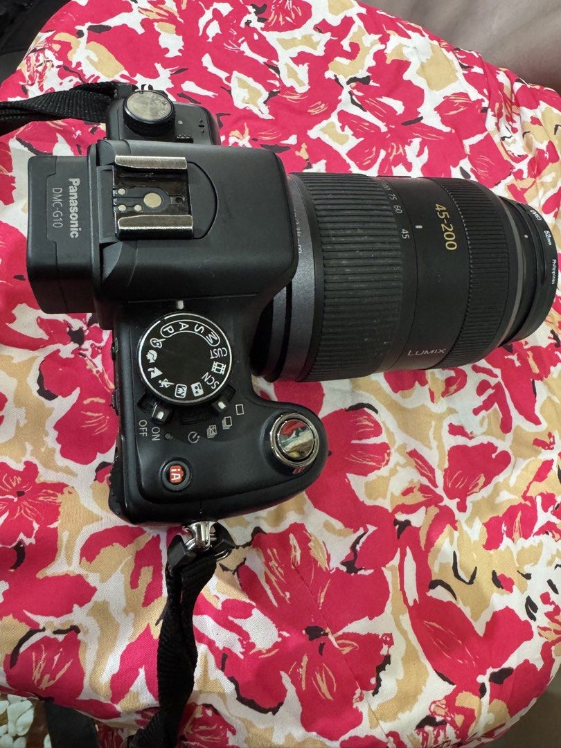 Panasonic Lumix DMC-G10 Mirrorless Camera with 2 Lenses (Category: Cameras) located in Manila. Submitted by wildbear.e10374 (Listing ID 1468094864, Image 3). Description: - Camera: Panasonic Lumix DMC-G10 mirrorless body (Black) - Lenses: Lumix G Vario 14-42mm & 45-200mm telephoto with Mega O.I.S. - Protection: Hoya UV(C) HMC filters attached to both lenses. This Camera have 2pcs lenses It’s came with Nikon Camera bag 2pcs battery And with Charge