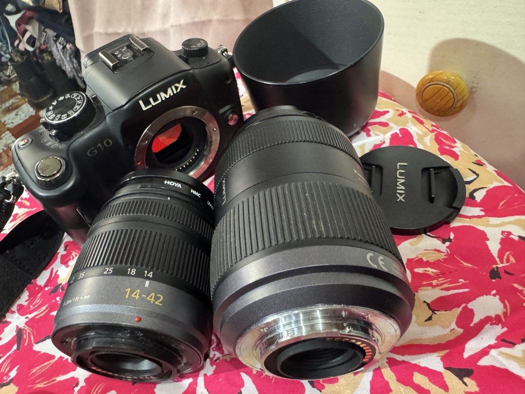Panasonic Lumix DMC-G10 Mirrorless Camera with 2 Lenses (Category: Cameras) located in Manila. Submitted by wildbear.e10374 (Listing ID 1468094864, Image 1). Description: - Camera: Panasonic Lumix DMC-G10 mirrorless body (Black) - Lenses: Lumix G Vario 14-42mm & 45-200mm telephoto with Mega O.I.S. - Protection: Hoya UV(C) HMC filters attached to both lenses. This Camera have 2pcs lenses It’s came with Nikon Camera bag 2pcs battery And with Charge