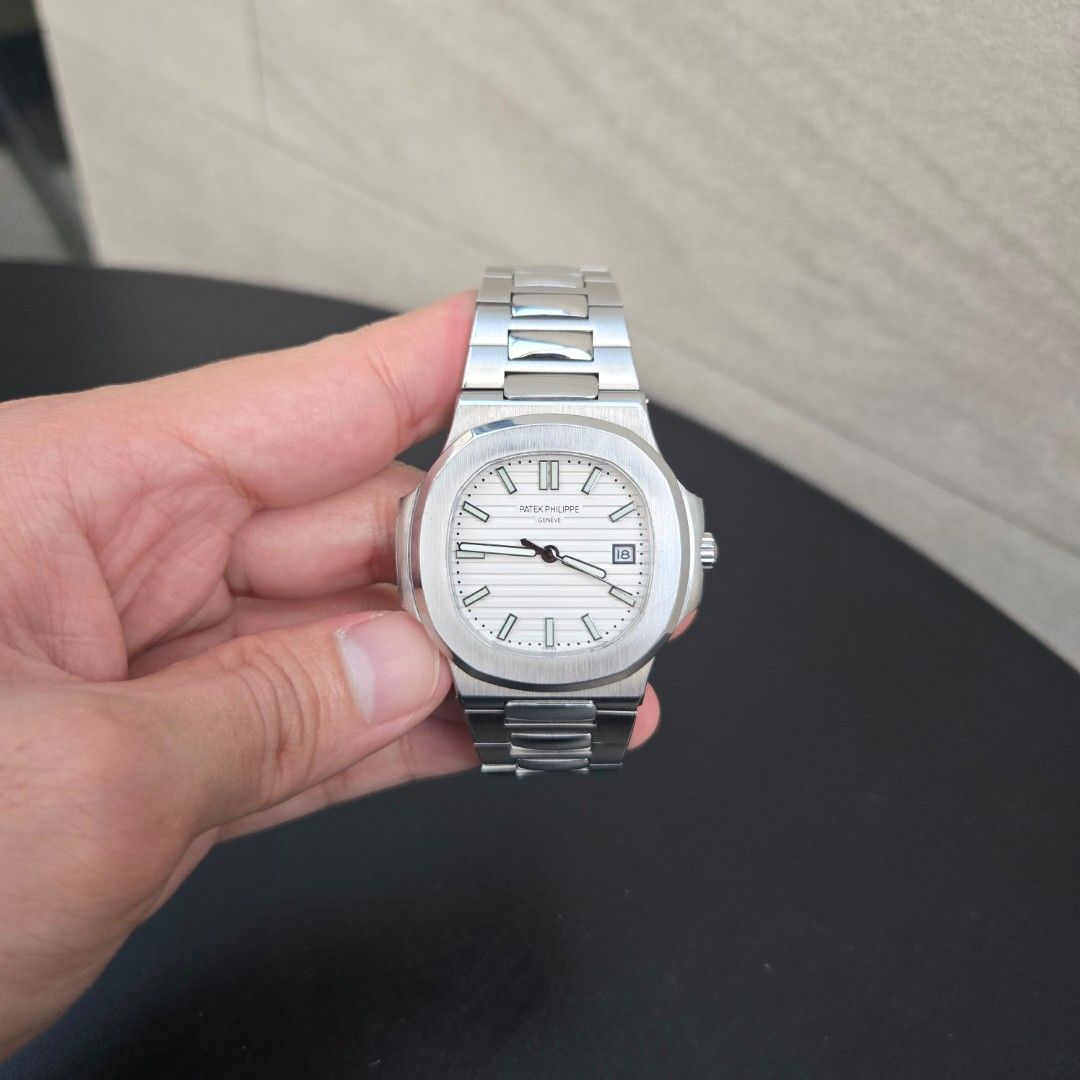 Patek Philippe Nautilus White Face (Category: Luxury Watches) located in San Juan City. Submitted by flipandfind (Listing ID 1468255915, Image 2). Description: Patek Philippe Nautilus White Face - watch only - slightly used, with scratches, sold as is, no extra links - check detailed photos for the condition P 18,000 Negotiable.