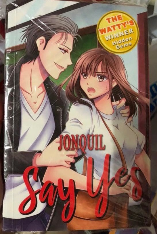 [PB] Say Yes by Jonquil (Category: Storybooks) located in San Juan City. Submitted by ttanmien (Listing ID 1468062102, Image 2). Description: ⚜️✨⚜️✨⚜️✨⚜️✨⚜️✨⚜️ 💁🏻‍♀️SELLING PRICE: ₱100 Original Price: ₱185 💁🏻‍♀️Book Genre: Fiction, Wattpad, Teen Fiction, Romance 💁🏻‍♀️Book insight: Johairah, a simple girl from the province, unexpectedly gets the chance to study at Mori High, the most prestigious university in the country. Unlike her wealthy,