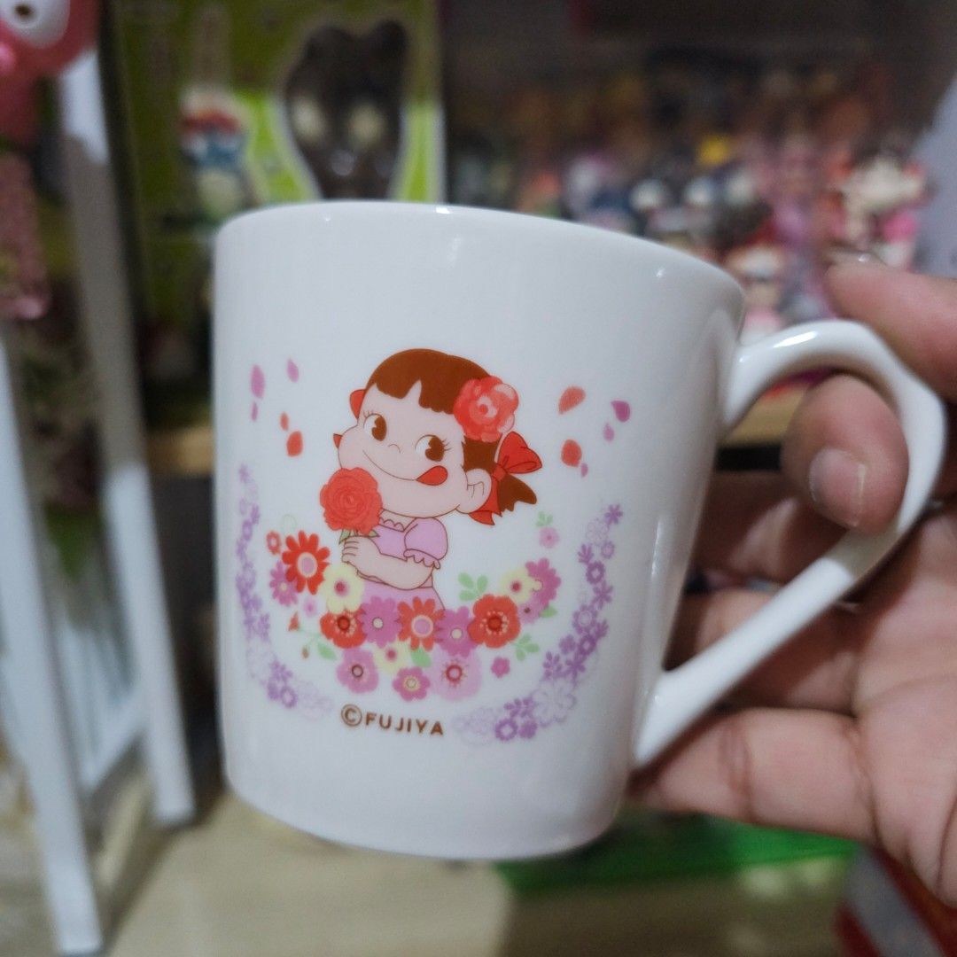 Peko-chan Mug (Category: Dinnerware & Cutlery) located in Manila. Submitted by lovelylovesjapan (Listing ID 1468213535, Image 1). Description: 🌸The item is on-hand and authentic from Japan 🌸Mode of Payment (MOP): GCASH/Bank Transfer 🌸Mode of Delivery (MOD): J&T or Lalamove (Shipping every Saturdays and Sundays) Notes: 🩷Breakable items are packed with care and caution. Seller will not be held liable for any damages incurred by the courier upon