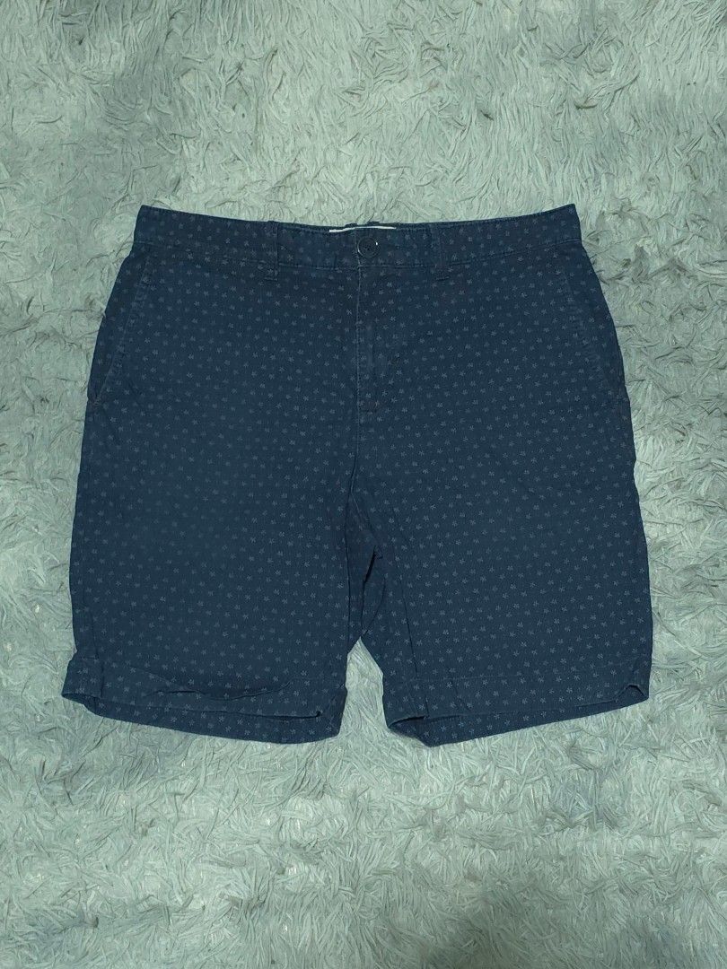 Penguin Patterned Shorts Navy Blue Size 32 (Category: Shorts) located in Abulug. Submitted by humanwhosellthings (Listing ID 1468137564, Image 1). Description: - Brand: PENGUIN Chino Short ✅Excellent Condition ✅Issue: none ▫️Waist Size: 30 ▫️Length: 17 - Color: Dark navy blue with subtle all-over floral/star pattern - Size: Small - Features: Zipper fly with button closure, 2 secure back pockets with button closures - Condition: Good, versatile fo