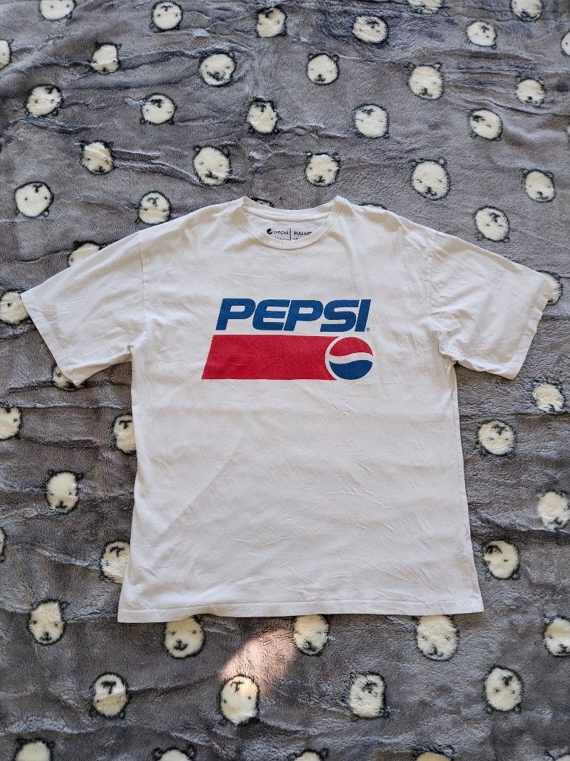 Pepsi × Pull&Bear "Gotta Have It" Tee — Size L (Category: Tshirts & Polo Shirts ) located in Mabalacat. Submitted by al_amin_thrift (Listing ID 1468115854, Image 1). Description: Pepsi × Pull&Bear "Gotta Have It" Tee — Size L ✅ Official PepsiCo x Pull&Bear collaboration ✅ Size L — relaxed oversized fit ✅ 100% cotton — soft & comfortable ✅ Iconic retro Pepsi graphic front + "Gotta Have It" back print ✅ Made in Turkey ✅ Good pre-loved condition ₱34