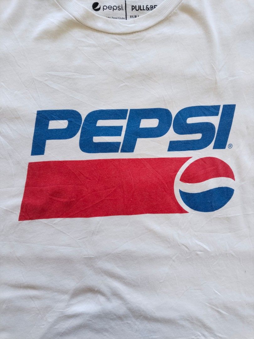 Pepsi × Pull&Bear "Gotta Have It" Tee — Size L (Category: Tshirts & Polo Shirts ) located in Mabalacat. Submitted by al_amin_thrift (Listing ID 1468115854, Image 2). Description: Pepsi × Pull&Bear "Gotta Have It" Tee — Size L ✅ Official PepsiCo x Pull&Bear collaboration ✅ Size L — relaxed oversized fit ✅ 100% cotton — soft & comfortable ✅ Iconic retro Pepsi graphic front + "Gotta Have It" back print ✅ Made in Turkey ✅ Good pre-loved condition ₱34