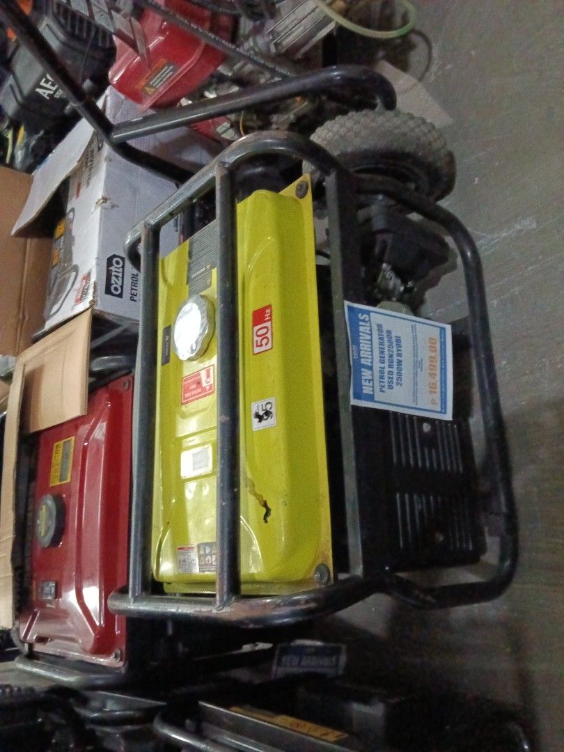 Petrol Generator RGN2500B 2500W RYOBI (Category: Construction Tools & Equipment) located in Manila. Submitted by jesicahmrsantarosa (Listing ID 1468142208, Image 2). Description: - Brand: Ryobi - Model: RGN2500B - Power Output: 2500W at 50Hz - Design: Durable black protective metal frame with a yellow fuel tank - Features: Includes top fuel cap and safety warning labels - Condition: Brand new arrival, ready for power backup needs.
