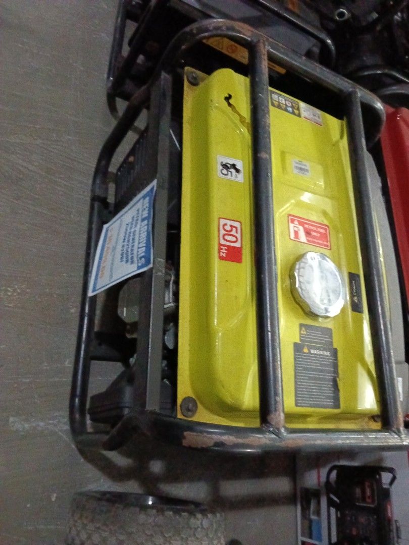 Petrol Generator RGN2500B 2500W RYOBI (Category: Construction Tools & Equipment) located in Manila. Submitted by jesicahmrsantarosa (Listing ID 1468142208, Image 3). Description: - Brand: Ryobi - Model: RGN2500B - Power Output: 2500W at 50Hz - Design: Durable black protective metal frame with a yellow fuel tank - Features: Includes top fuel cap and safety warning labels - Condition: Brand new arrival, ready for power backup needs.