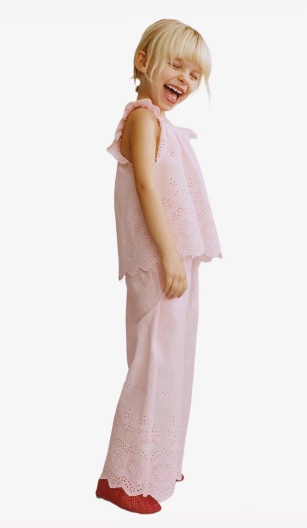 Pink Eyelet Ruffle Top and Pants Set (Category: Sets or Coordinates) located in Manila. Submitted by ishi_1 (Listing ID 1468224053, Image 1). Description: Pink eyelet lace top and matching pants set. Sleeveless top with ruffled straps and scalloped hem. Cropped pants feature elastic waistband and detailed embroidery at the lower legs. Note on sizing: top is size 2y, bottom is size 3y. Unworn condition..