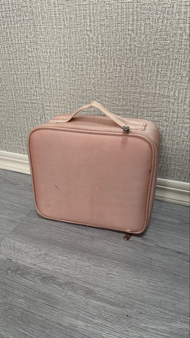 Pink Makeup Organizer Train Case with Adjustable Dividers (Category: Makeup) located in Makati City. Submitted by glyzacatalan (Listing ID 1468084769, Image 2). Description: - Color/Exterior: Cute pink with a durable textured fabric and sturdy top handle - Interior: Lined in black plastic with customizable movable slot dividers - Storage: Lid includes secure brush slots with protective flaps and a handy zipper pocket - Condition: Zippers work smo