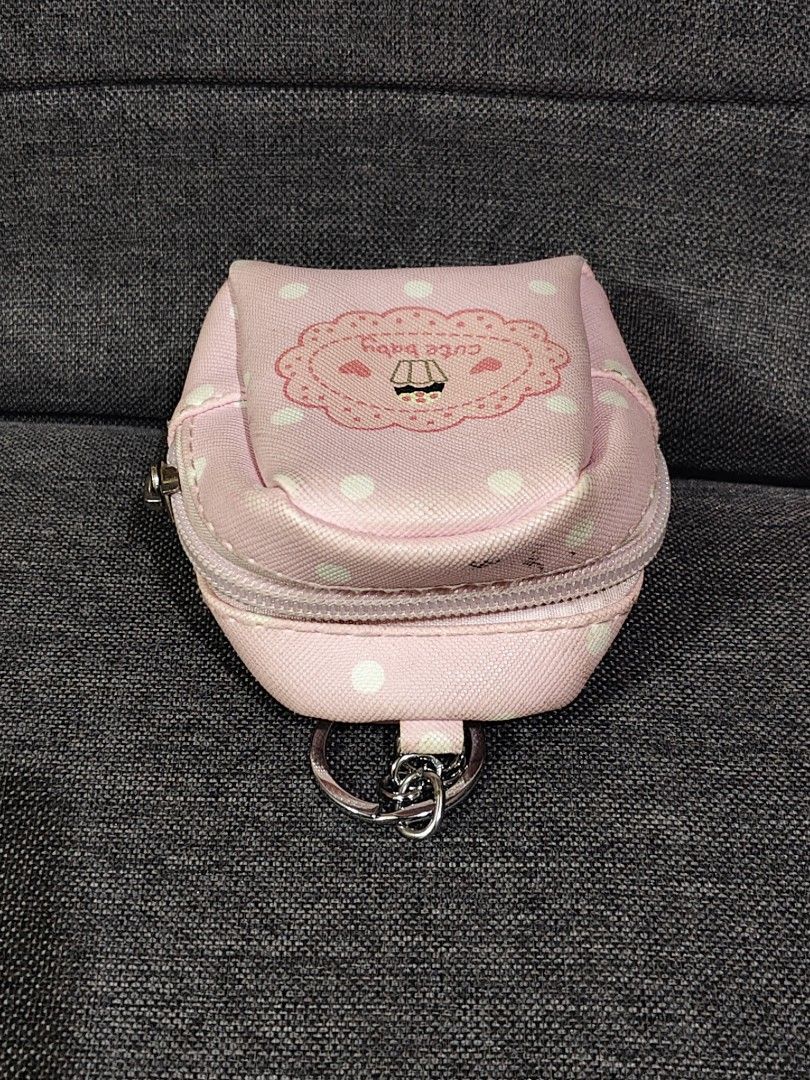 pink polka-dot mini backpack coin purse keychai (Category: Wallets & Card holders) located in Bulacan. Submitted by angel.decluttersx (Listing ID 1468271179, Image 2). Description: rfs: not my style.