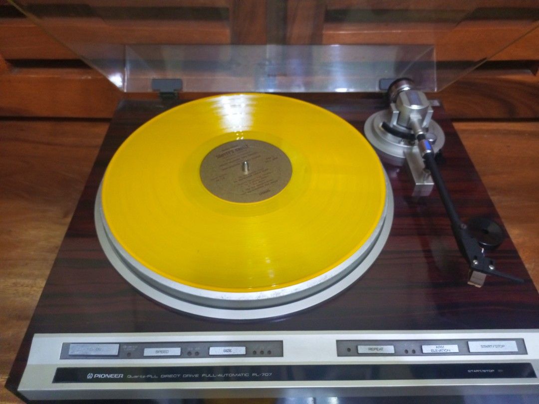 Pioneer Quartz-PLL Direct Drive Full-Automatic PL-707 Turntable (Category: Vinyls) located in Manila. Submitted by jaysaet1626847 (Listing ID 1468083849, Image 1). Description: - Vintage Pioneer PL-707 turntable with a stylish woodgrain finish - Quartz-PLL direct drive system for rock-steady speed accuracy - Fully automatic operation with easy front-panel controls for power, speed, size, repeat, arm elevation, and start/stop - Includes attached c