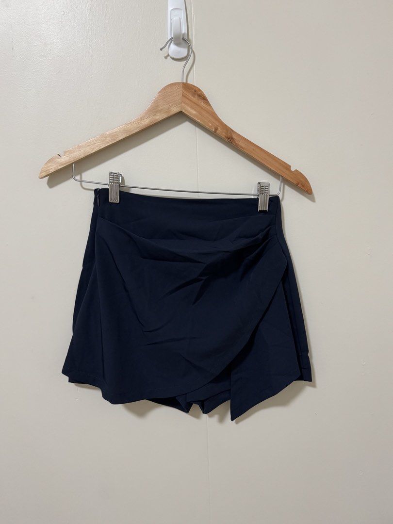 Plains & Prints Jolie Skort Navy XS (Category: Skirts) located in Manila. Submitted by gotlistedph (Listing ID 1468209864, Image 3). Description: - Brand: Plains & Prints - Style: Jolie Skort (Wrap-front skirt look with shorts underneath) - Color: Navy Blue - Size: XS / UK 6 / US 2 - Closure: Side zip - Condition: Brand new with original retail tags - Original Price: PHP 1,798.00.