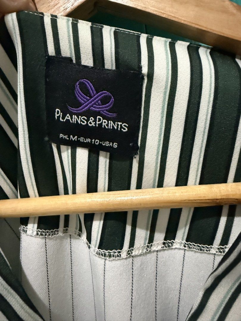 Plains & Prints White and Green Striped Blouse (Category: Blouses) located in Mandaluyong City. Submitted by ecowarriorph (Listing ID 1468251844, Image 2). Description: - Brand: Plains & Prints - Design: White with green & black vertical stripes - Details: Long sleeves with button cuffs, V-neckline with contrasting crossover panels, elasticated back hem - Size: PHL M (EUR 10, USA 6) - Condition: No flaws. In excellent condition. RFS: Decluttering