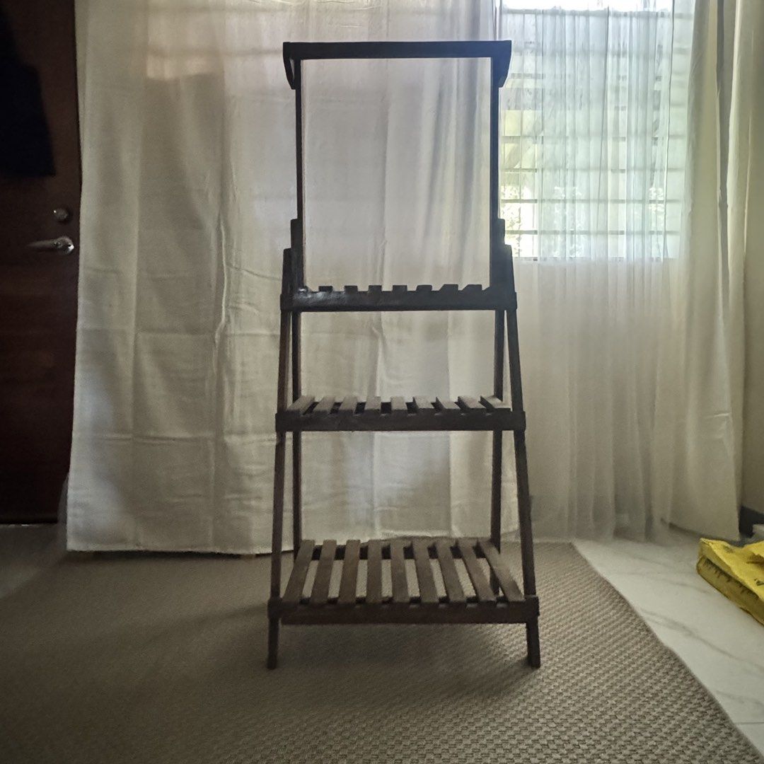 Plant Display Shelves (Category: Shelves, Cabinets & Racks) located in Marikina City. Submitted by repurpose_studio (Listing ID 1468113803, Image 2). Description: - Type: Freestanding A-frame wooden shelf unit - Storage: 3 slatted shelves for storage or display - Extra Feature: Top horizontal bar ideal for Vine plants - Condition: Excellent / Ready to use - Perfect for indoor plants display reason for selling - not in use and will move out.