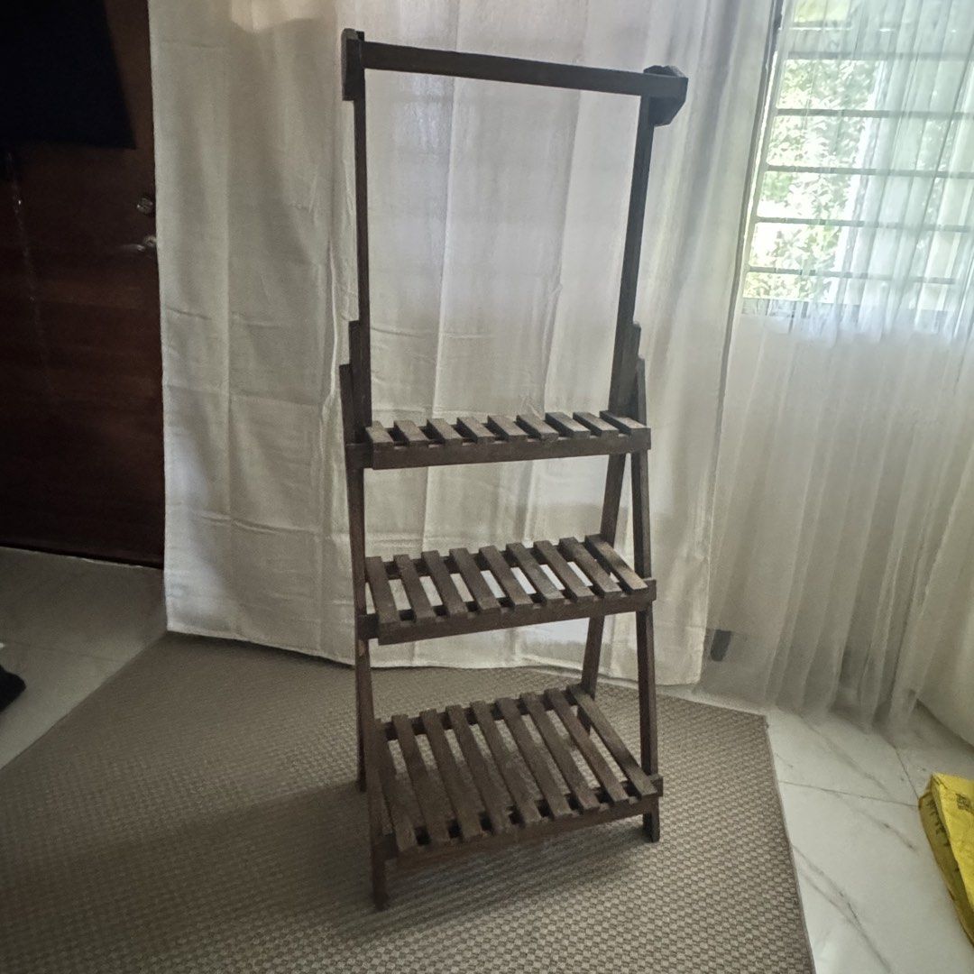 Plant Display Shelves (Category: Shelves, Cabinets & Racks) located in Marikina City. Submitted by repurpose_studio (Listing ID 1468113803, Image 1). Description: - Type: Freestanding A-frame wooden shelf unit - Storage: 3 slatted shelves for storage or display - Extra Feature: Top horizontal bar ideal for Vine plants - Condition: Excellent / Ready to use - Perfect for indoor plants display reason for selling - not in use and will move out.