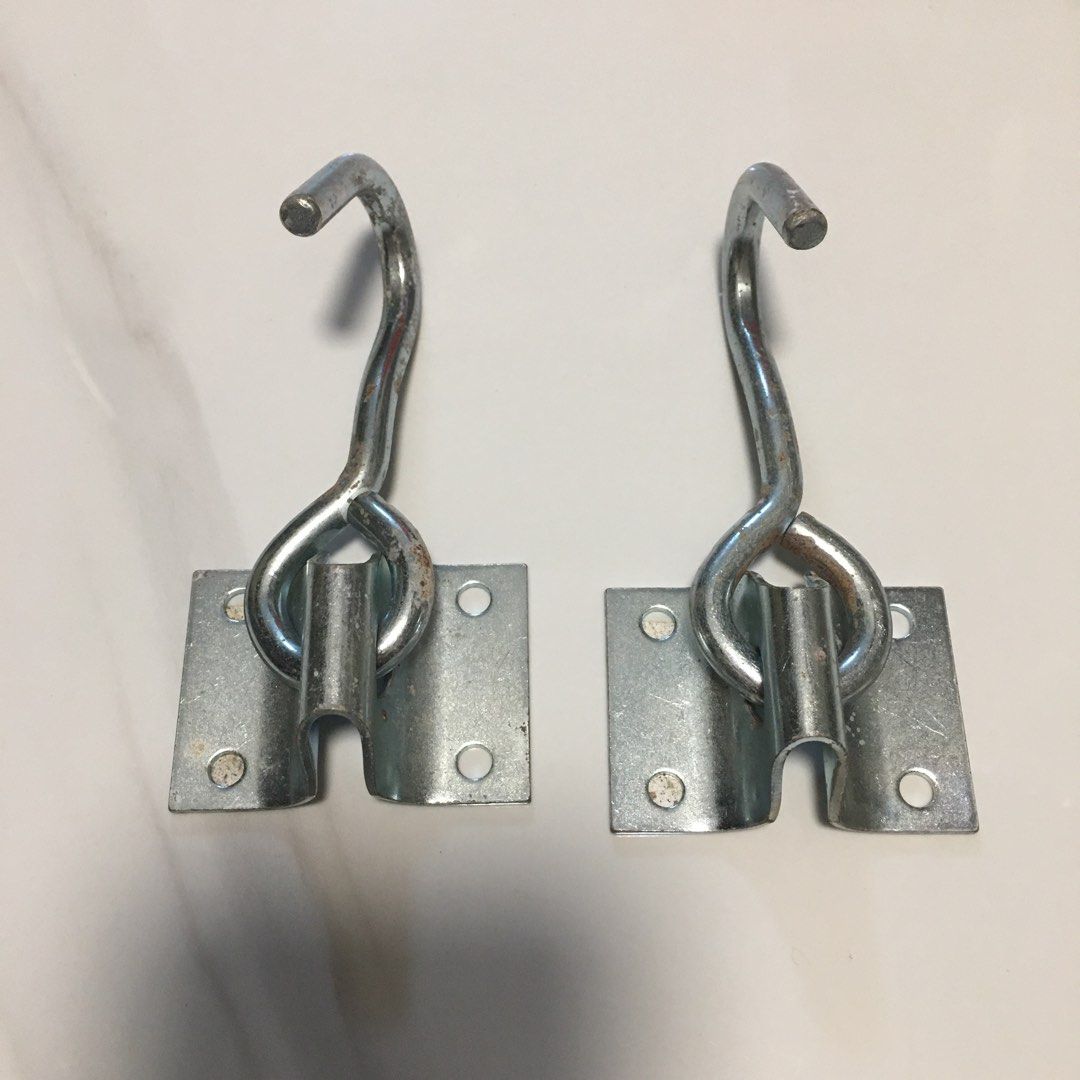 Plate hanging hooks ceiling wall mount heavy duty hooks (Category: Hooks & Hangers) located in Pasay City. Submitted by gilbertso62551 (Listing ID 1468148059, Image 2). Description: - Set of 2 sturdy steel J-shaped hanging hooks - Base plates feature 4 screw holes each for secure wall mounting - Versatile use for hanging plants, tools, and household items - Condition: Minor rust spotting from storage, Japanese label on the back - Perfect for orga