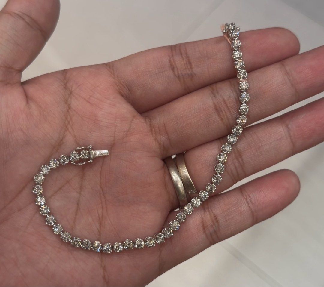 Platinum Tennis Bracelet (Category: Bracelets) located in Las Pinas. Submitted by houseofgems0 (Listing ID 1468234741, Image 1). Description: Details: - PT850 | 8.1g - Size: 18cm - 47 round brilliant-cut natural diamonds (near colorless, VVS/SI) - Dia: 5ct stamped - PRICE: ₱100,000 💎 All items are 100% AUTHENTIC/PAWNABLE. Send us a message to inquire..