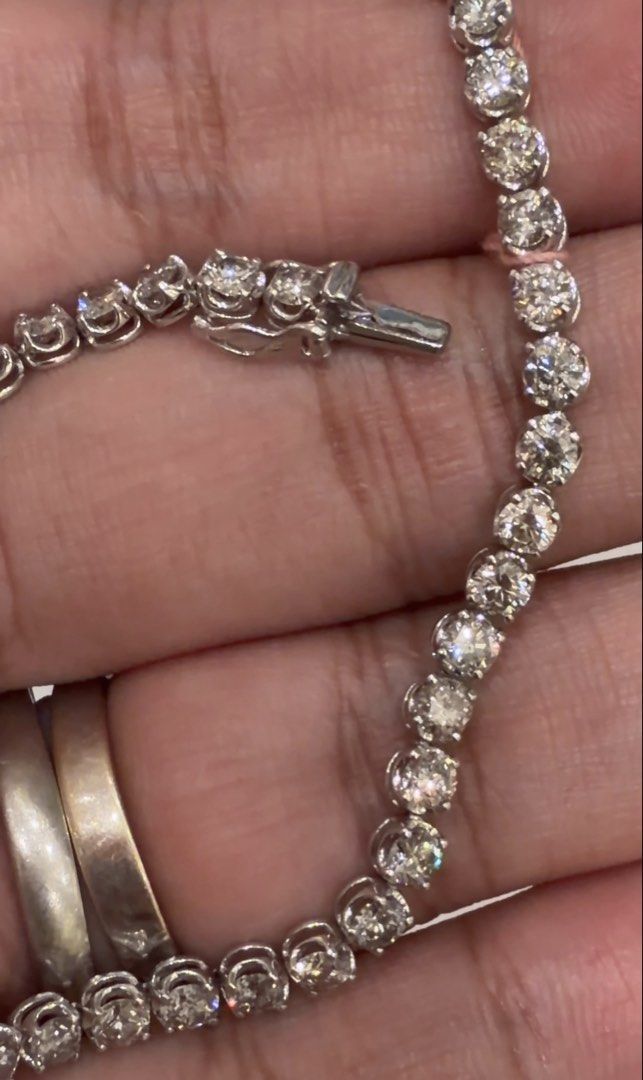 Platinum Tennis Bracelet (Category: Bracelets) located in Las Pinas. Submitted by houseofgems0 (Listing ID 1468234741, Image 3). Description: Details: - PT850 | 8.1g - Size: 18cm - 47 round brilliant-cut natural diamonds (near colorless, VVS/SI) - Dia: 5ct stamped - PRICE: ₱100,000 💎 All items are 100% AUTHENTIC/PAWNABLE. Send us a message to inquire..