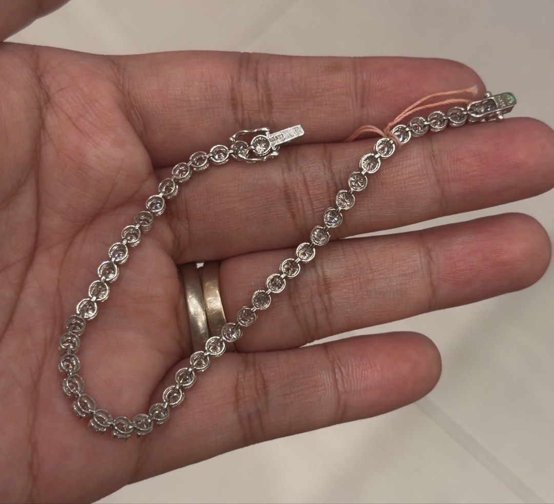 Platinum Tennis Bracelet (Category: Bracelets) located in Las Pinas. Submitted by houseofgems0 (Listing ID 1468234741, Image 2). Description: Details: - PT850 | 8.1g - Size: 18cm - 47 round brilliant-cut natural diamonds (near colorless, VVS/SI) - Dia: 5ct stamped - PRICE: ₱100,000 💎 All items are 100% AUTHENTIC/PAWNABLE. Send us a message to inquire..