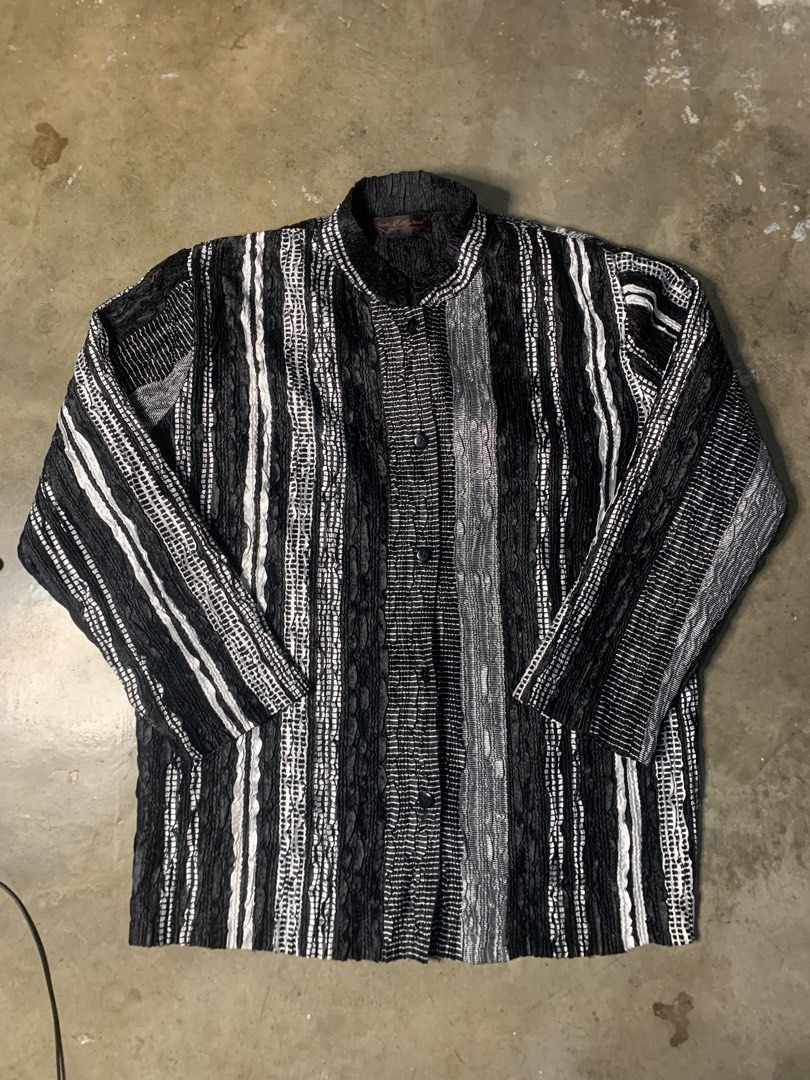 Pleats Collection Button Up Top (Category: Blouses) located in Manila. Submitted by armamentoj94205 (Listing ID 1468193297, Image 1). Description: - Brand: Pleats Collection - Size: XL - Color/Pattern: Black and white vertical stripes - Material: 100% polyester (textured crinkle fabric) - Features: Long sleeves, collared neckline, button-up front - Style: Great statement piece for layering.