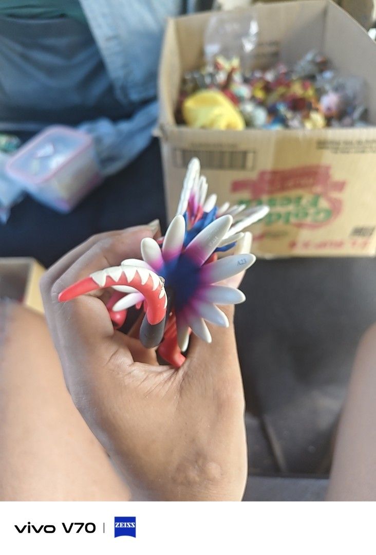 Pokemon Koraidon Figure (Category: Figurines & Statues) located in Kapangan. Submitted by ClumZyDale (Listing ID 1468084454, Image 2). Description: - Pokémon: Koraidon (Pokémon Scarlet and Violet) - Design: Highly detailed sculpt with vibrant red body, white feathers, and blue accents - Display: Stands on its own, perfect for desks or shelves - Condition: Loose item, no box included.