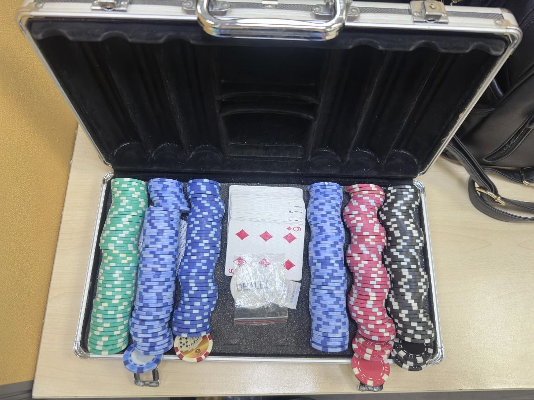 Poker Chip Set with Aluminum Carrying Case (Category: Board Games & Puzzles) located in Caloocan City. Submitted by qualityseller02 (Listing ID 1468155216, Image 1). Description: - Complete poker chip set with multiple stacks of colored chips, playing cards, and a dealer button - Housed in a sturdy metal carrying case for easy storage and transport - Black foam-lined interior keeps all components secure and organized - Ideal for poker nights, par