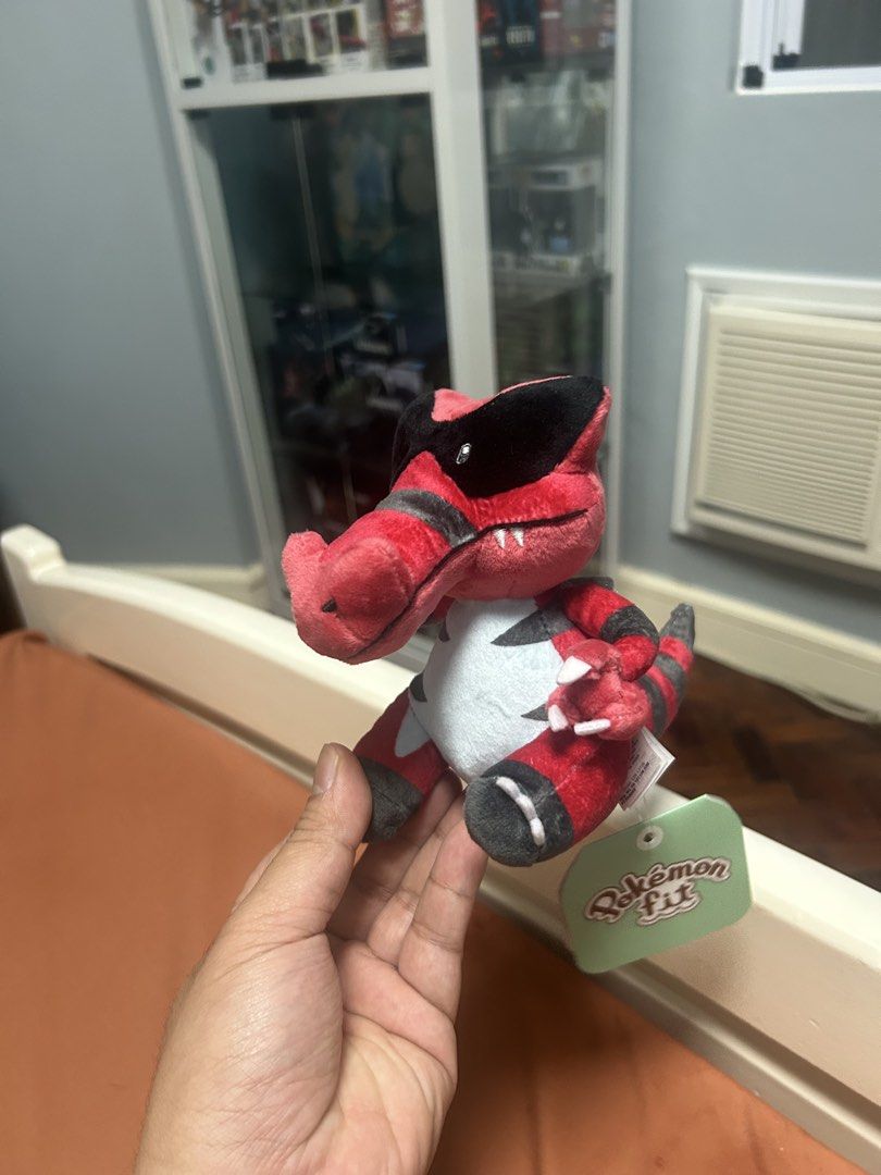 Pokémon Fit Krookodile Plush (Category: Plushies & Soft Toys) located in San Jose. Submitted by jocamaoz (Listing ID 1468121420, Image 2). Description: - Official Pokémon Center merchandise from the popular Pokémon Fit line - Features vibrant red, black, and white colors with high-quality embroidered details - Made with a soft, huggable fabric texture - Includes original tag attached to the foot - Perfect addition to any Pokémon plush collection 