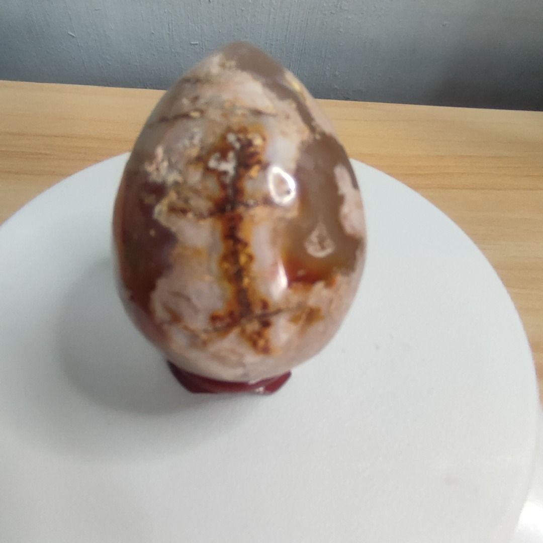 Sakura Agate Egg (Category: Precious Stones) located in Taguig. Submitted by joyofcrystals (Listing ID 1468120083, Image 3). Description: 🌸 Sakura Agate Egg (Cherry Blossom Agate) 🌸 A gorgeous piece of nature’s art to bring growth, calm, and joy to your space! ✨ This piece has such a cozy, dreamy vibe—perfect for your work desk, bedside table, or crystal display shelf. 🌿✨ Type: Sakura Agate Egg (comes with a display stand!) Length: 59.8 mm Wid