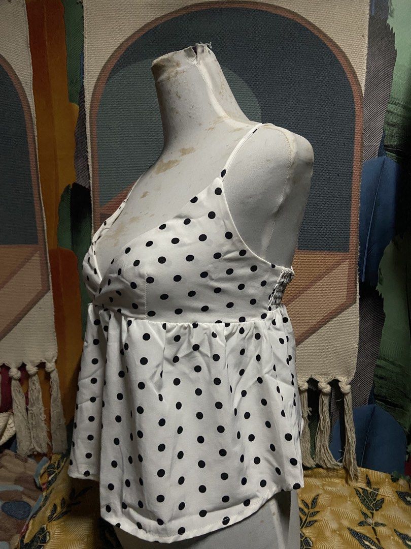 Polka Peplum V Top (Category: Sleeveless) located in Pasig City. Submitted by aeclosetco (Listing ID 1468220445, Image 2). Description: Size on tag: Medium Size: Small-Semi Large No Exchange, No Cancellation and No Refund 📍Santolan, Pasig City MOP: Gcash Note: Shipping fee is not included.