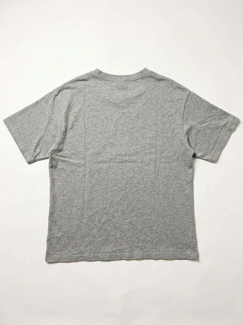 Polo Ralph Lauren Grey T-Shirt (Category: Tshirts & Polo Shirts ) located in Urdaneta. Submitted by goldeneagle-e662 (Listing ID 1468280472, Image 2). Description: - Brand: Polo Ralph Lauren - Color: Solid heather grey - Material: 100% Cotton - Fit: Standard fit - Details: Short sleeves, crew neck, and navy blue embroidered pony logo on the left chest - Condition: Excellent, clean interior neck tag intact.