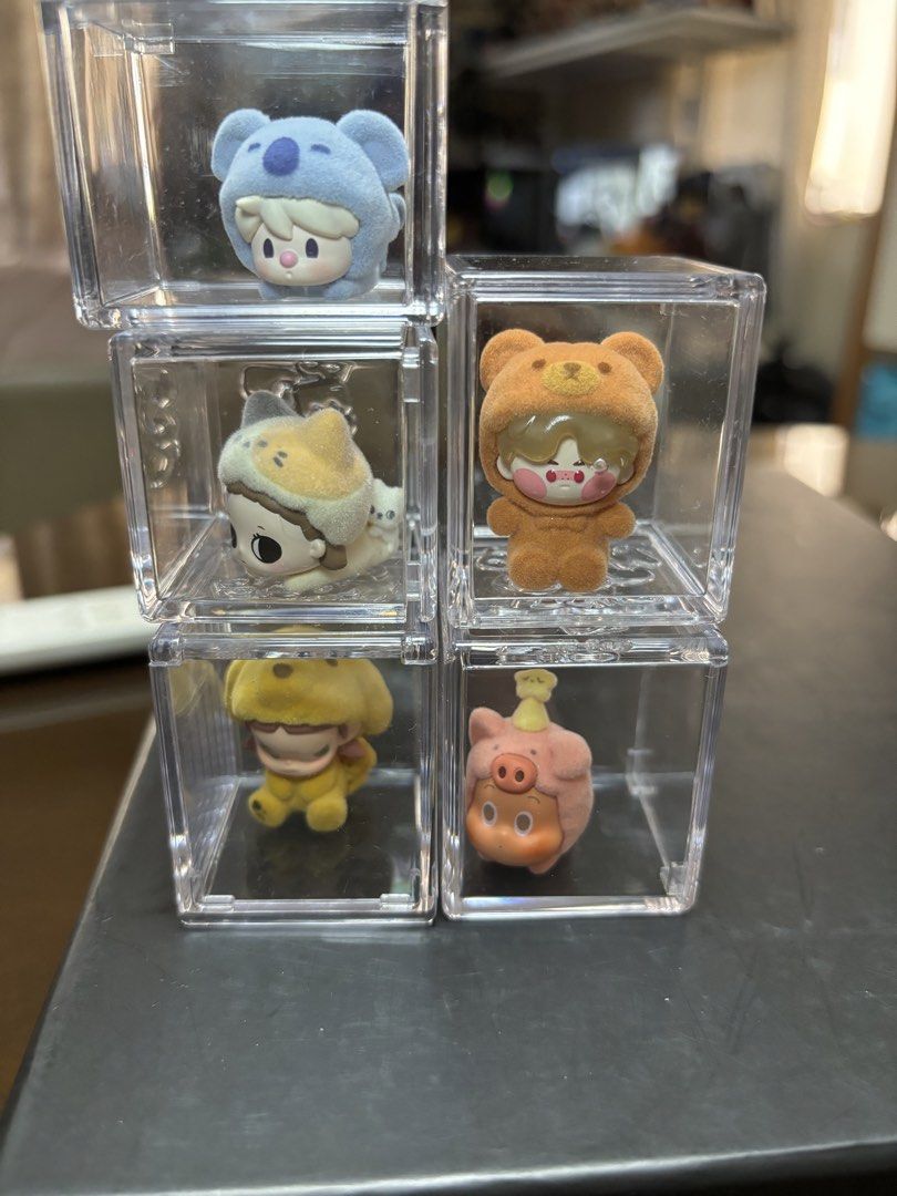 Pop Bean pajama cross dressing with Display Cases (Category: Designer & Blind Box Toys) located in Pasig City. Submitted by k8s_charm_est.2021 (Listing ID 1468086337, Image 2). Description: - Complete set of 5 Skullpanda Pop Mart blind box figures: cat, bear, koala, pig, and yellow hooded character - Includes a clear stackable display cube for every single figurine - Features soft flocked texture on the animal onesies - RFS: Decluttering / Extra 